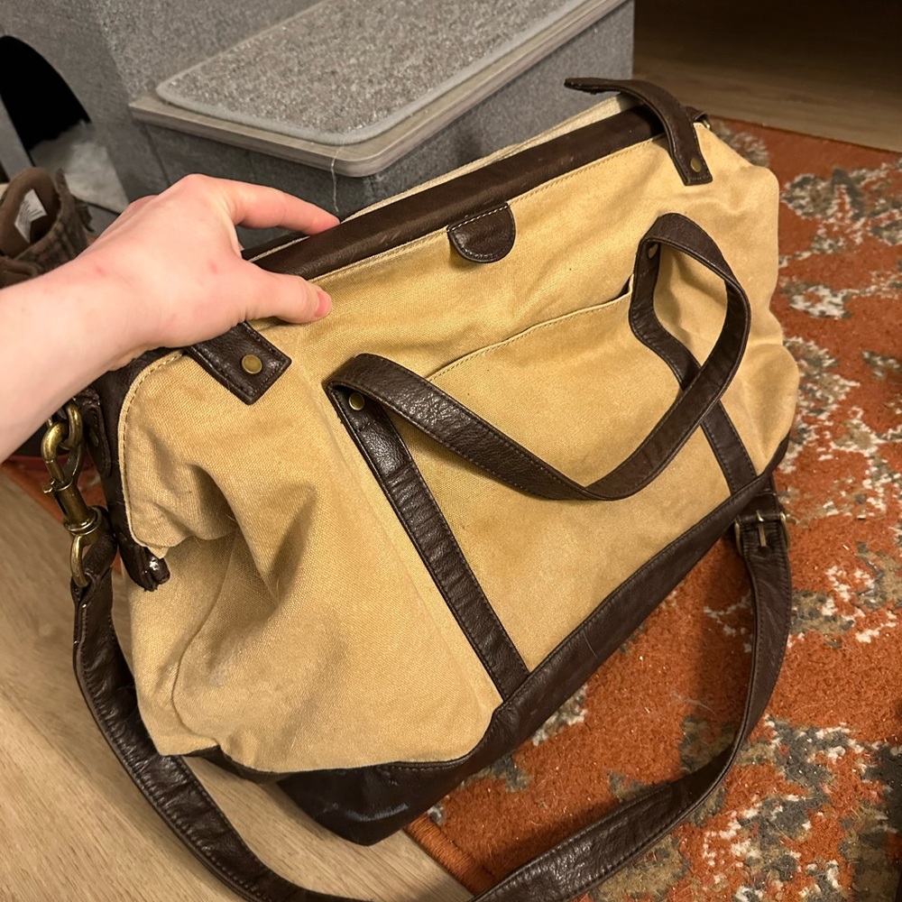 Tan/light brown bag with adjustable shoulder strap